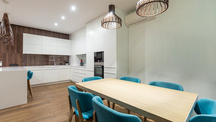 white-kitchen-with-wood-table