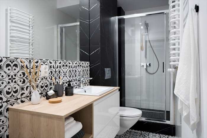 white bathroom with modern tiles