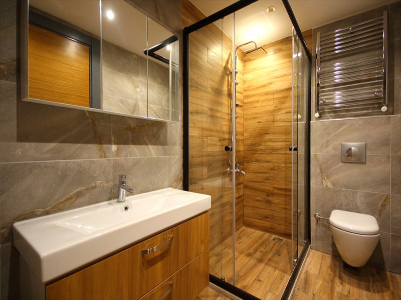 grey and brown minimalist bathroom