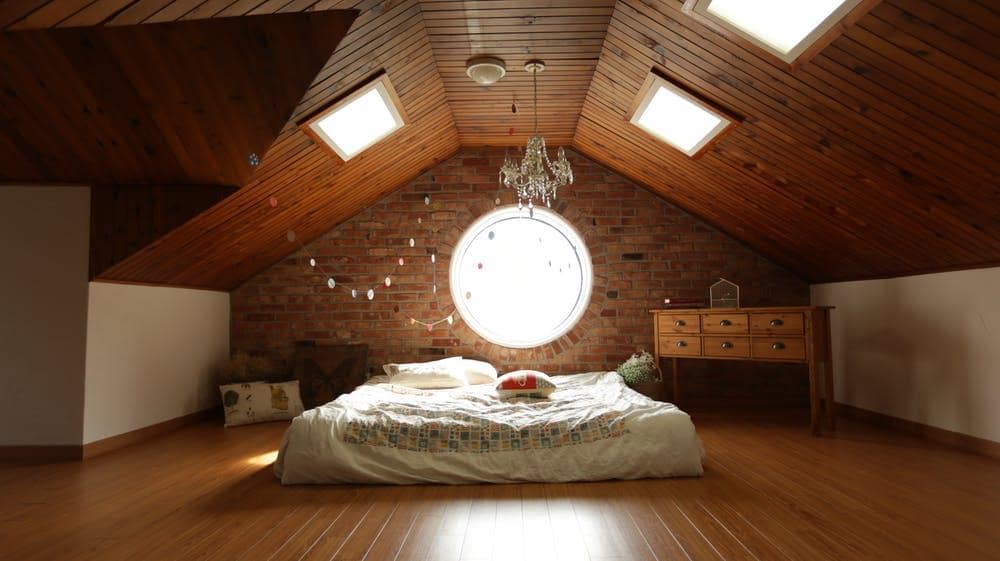 Protect Your Health with Organic Mattresses and Pillows. Beautiful loft bedroom with platform bed and plank flooring