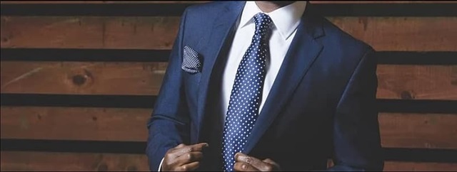 businessman in dark blue suit