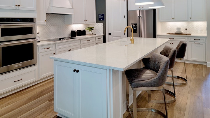 kitchen with island and high stools