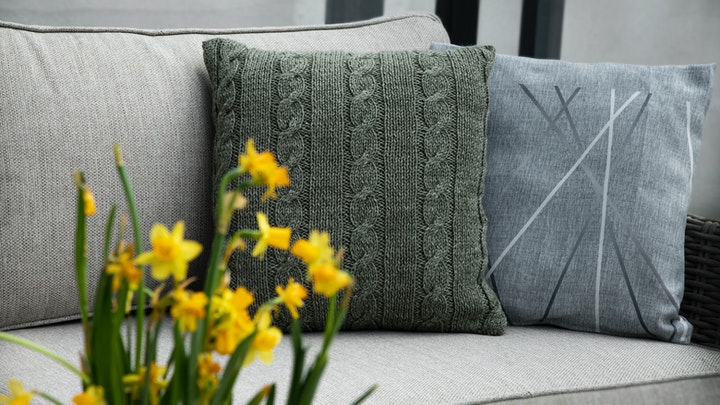 different textured cushions on the sofa