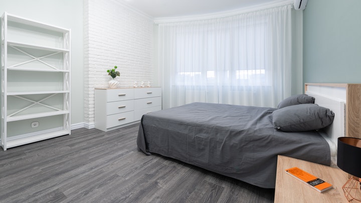 bedroom with white furniture