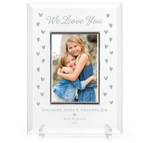 carved glass picture frame of two little girls