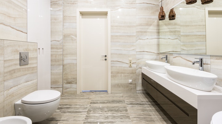 bathroom with double and oval sink