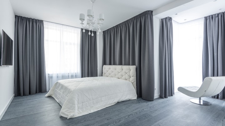 bedroom with large curtains