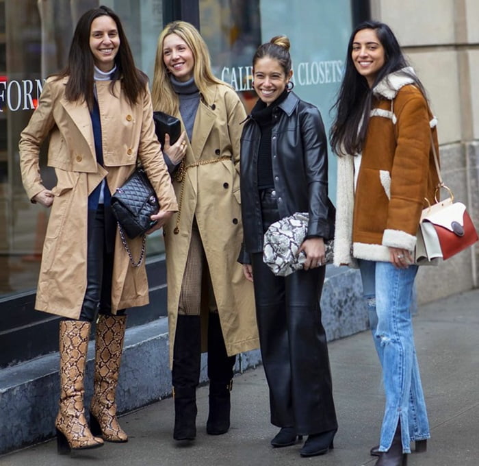 4 Women Carrying Bags