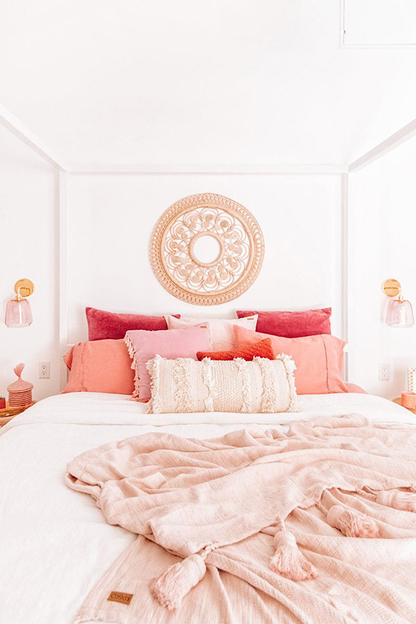 Cheerful and beautiful wedding room with white textiles and roses