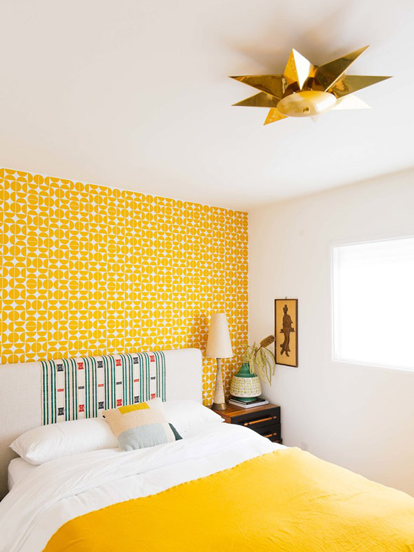 Cheerful and beautiful double bedroom in yellow