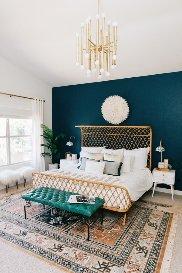 Cheerful and beautiful double bedroom in petrol blue and gold