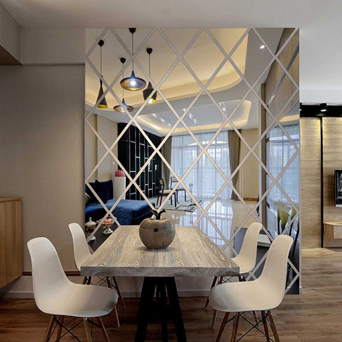 Dining room decorated with diamond mirror wall