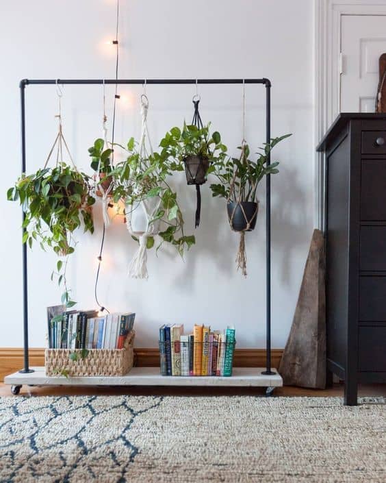 Use sticks to hang your plants