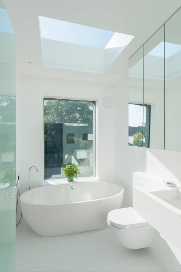 5 Ways to Enhance Your Bathroom. Freestanding eggshell bathtub as bathroom accent