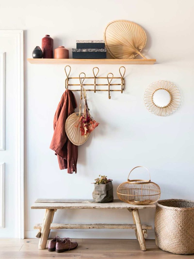 Small wooden bench in an entryway