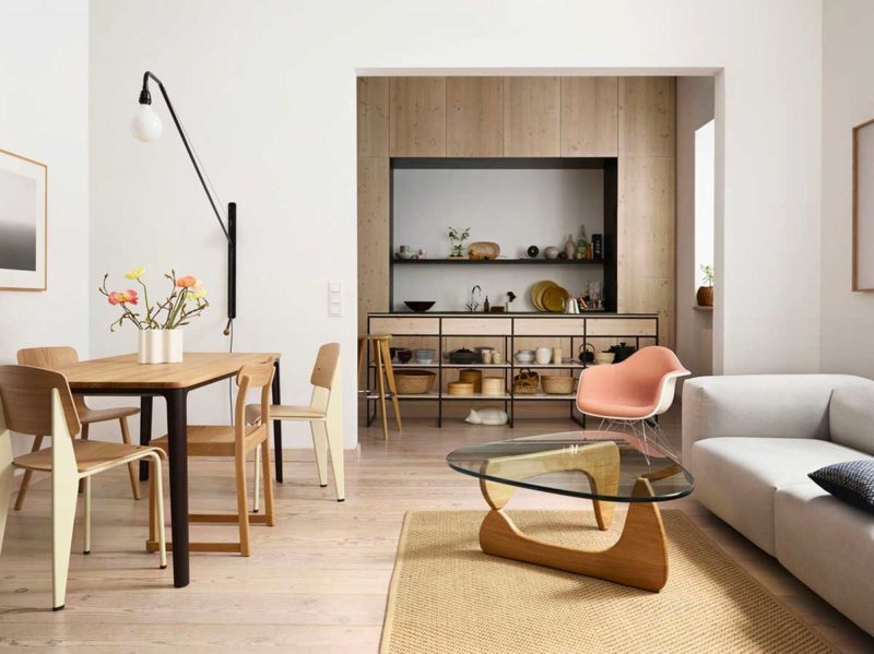 Coffee table with wooden base and glass top