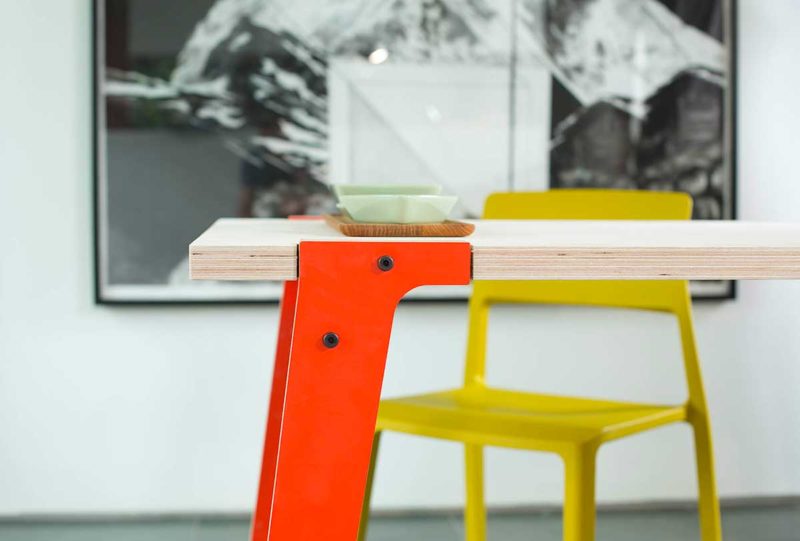 Table with plywood top and colored legs