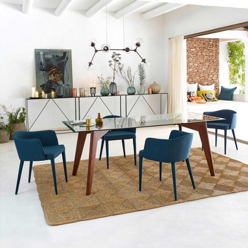 Dining room with designer glass and wood table