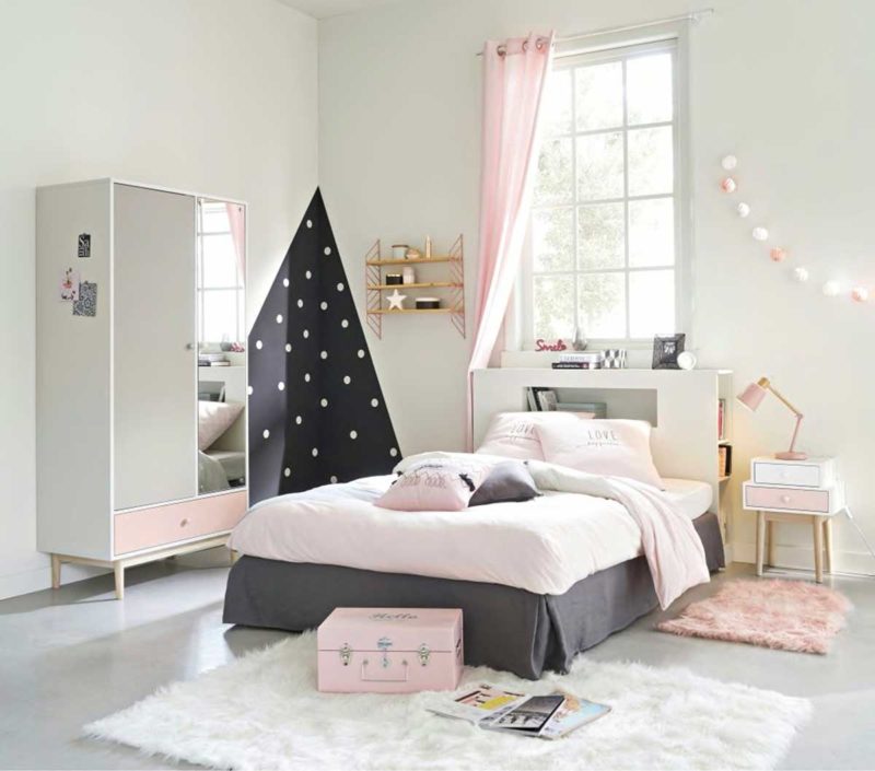 Girl's bedroom with bookcase headboard