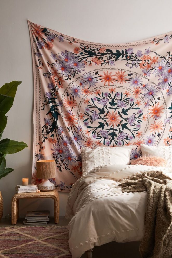 A hanging fabric square to create a bohemian headboard