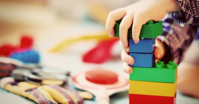 Boy playing lego