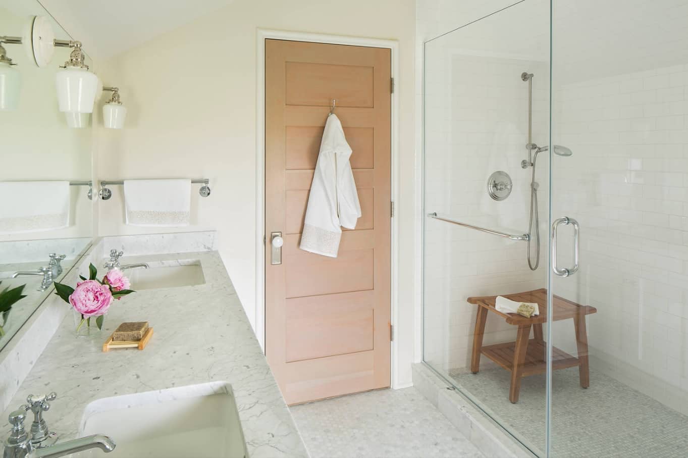 Making the Most of a Small Bathroom. Contemporary style bathroom in pastel colours with wooden doors