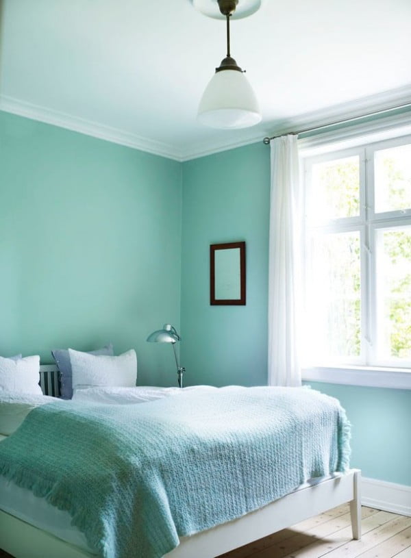 Small mint and white bedroom